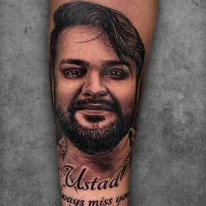 Hyper-realistic portrait tattoo of a face by Sachin at Ortus Tattoo Delhi